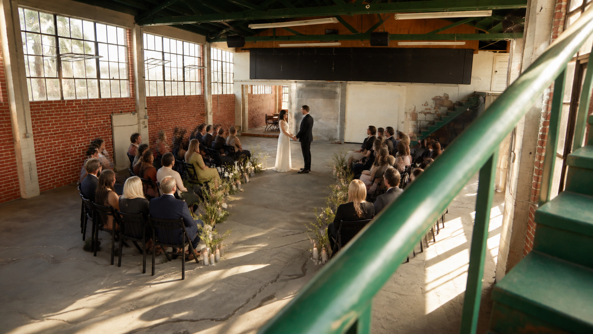 Conceptual modern ceremony viewed from the green staircase at Citadel Riverside